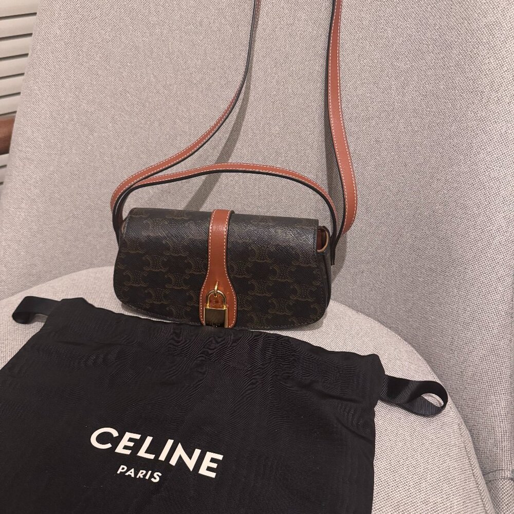 Celine Triomphe Canvas and Calfskin Clutch On Strap